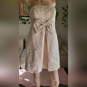 Elegant Cream and Gold Brocade Dress with Bow